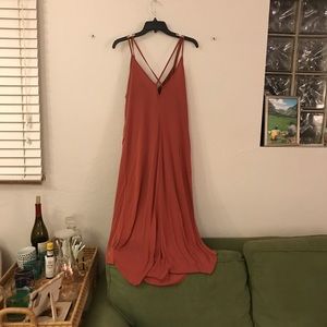 Stretchy high low dress with cross cross back.